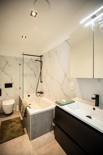 Fürdőszoba, City Housing Genk in Genk