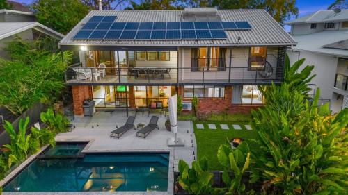 Spacious Coastal Getaway with Poolside Views