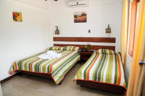 1 queen bed, 2 twin beds, 1 sofa bed