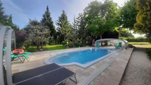 Maison d'une chambre avec piscine partagee jardin amenage et wifi a Le Thor