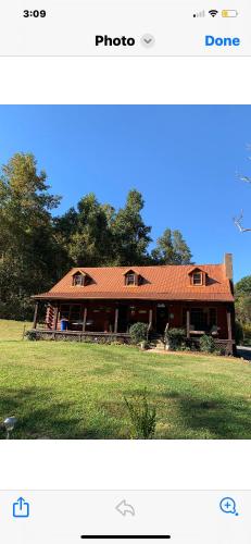 Log Cabin in the Field in Huntington, USA