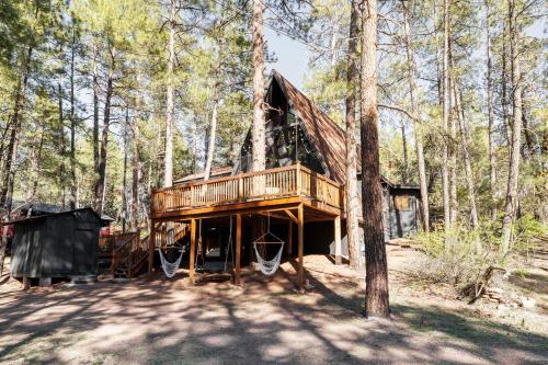 Pet-Friendly Pine Cabin with Hot Tub and Fire Pit!