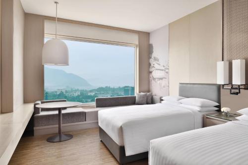 Camera twin, vista sulle montagne, accesso al salone comune