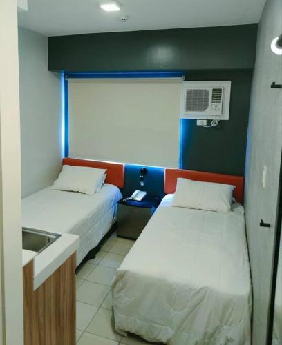 Stay & Travel - Condo-Hotel along EDSA