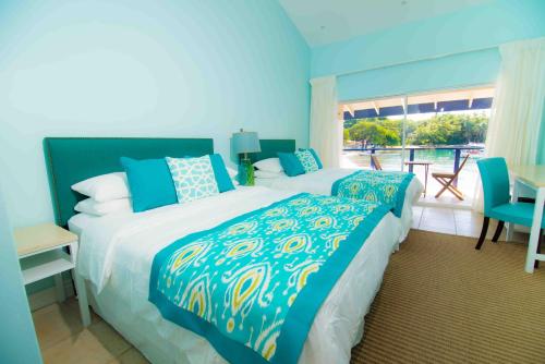Twin room, garden view, beach view, kitchen
