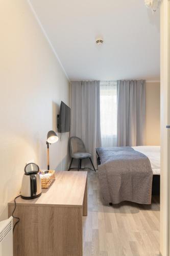 Hotell Regine - Tap to explore photos