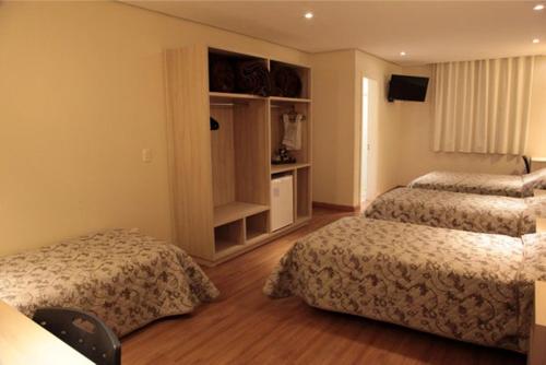 1 double bed, 3 twin beds