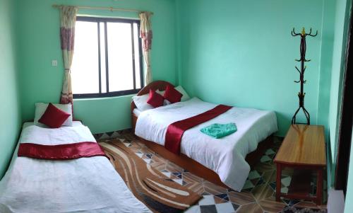 Deluxe Room (2 Adults + 1 Child) room in Sarangkot Hotel New Galaxy