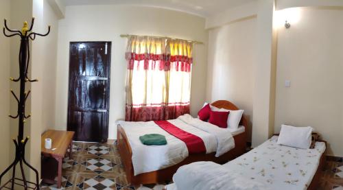 Deluxe Double Room (2 Adults + 1 Child) room in Sarangkot Hotel New Galaxy