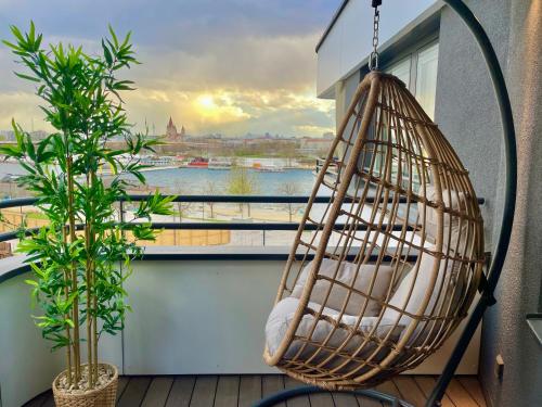 Riverfront Apartment with Balcony & AC