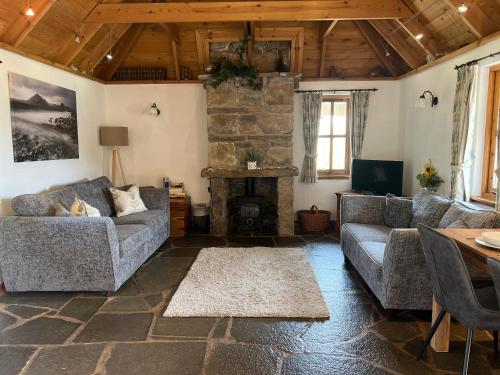 Közös társalgó / TV, Tigh Phadraig at Marys Thatched Cottages in Elgol