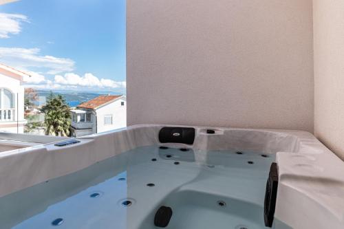 Bañera de hidromasaje, Apartment Krk with jacuzzi in Isla de Krk