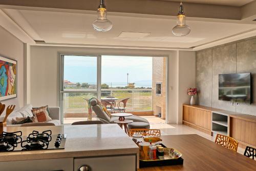 Duplex sofisticado com vista para mar #004