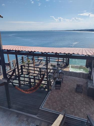 Erkély/terasz, Pousada Marambaia Cafe - Praiana, economica, Com cafe da manha, piscina e hidromassagem ao ar livre  in Guaratiba