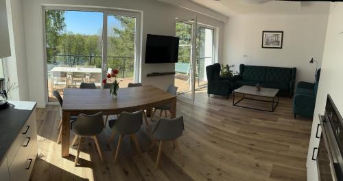 Közös társalgó / TV, Dom nad jeziorem Gaja House in Kozlowo