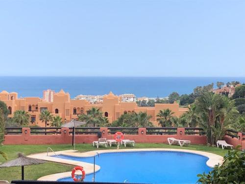 New renovated 2 bed sleeps 7 overlooking pool with superb sea views