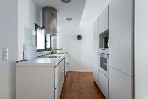 Kitchen, Apartamento Sant Josep 11 by costablancarent near Cafeteria YAIZA