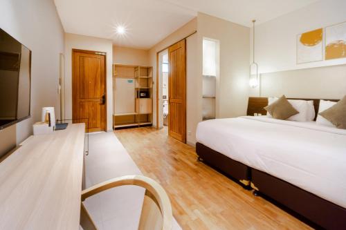 Tanaga CoLiving near Queen's Tandoor Indian Cuisine