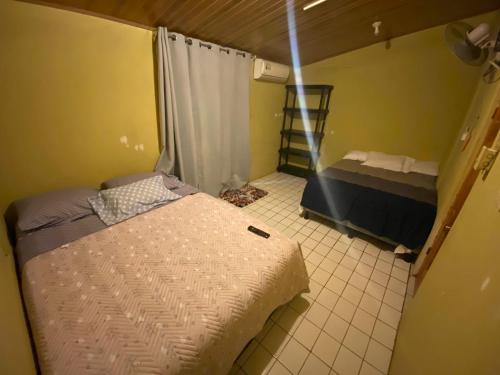 1 queen bed, 1 double bed, 1 twin bed