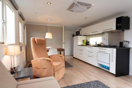 Knus huisje op kindvriendelijk park met zwembad in Otterlo