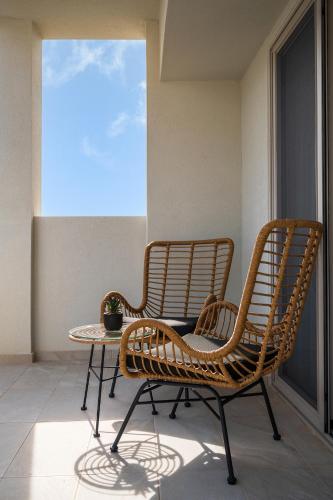 Milatos Seaside Suites - Tap to explore photos