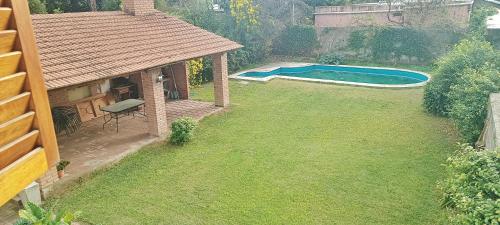 Garden, Casa con quincho y pileta in Arguello