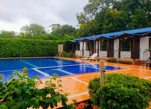 Swimming pool, Cabanas El Saman Villavicencio in Villavicencio