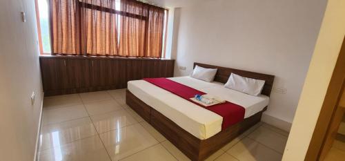 Redbell Suites Edavanna