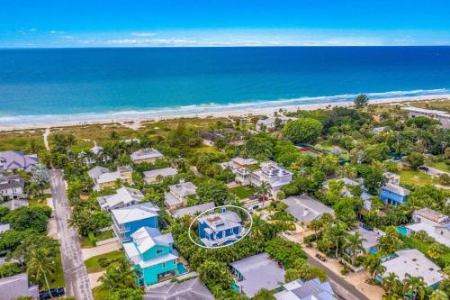 Above it All: Rooftop Deck Gulf Views Pool 5 Homes to Beach by Anna Maria Life Vacation Rentals - image 3
