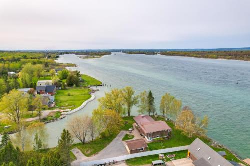 . Riverfront Sault Ste Marie Home w/ Dock!
