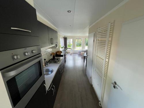 厨房, Forest Family 6 persoons op 5 sterren park in 比克卑尔根