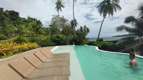 Swimming pool, Kembali CONDO Resort with Sea View in Kaputian District - Samal Island