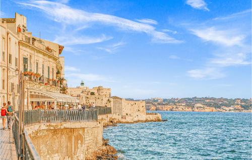 Awesome Home In Siracusa With Outdoor Swimming Pool, Wifi And 3 Bedrooms