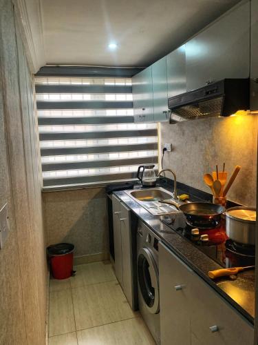Loft Studio Unit in Lekki phase 1 - 2 ACs, Kitchen, Closet & Ironing room, Netflix, WI-FI, Bath tub  in 萊基