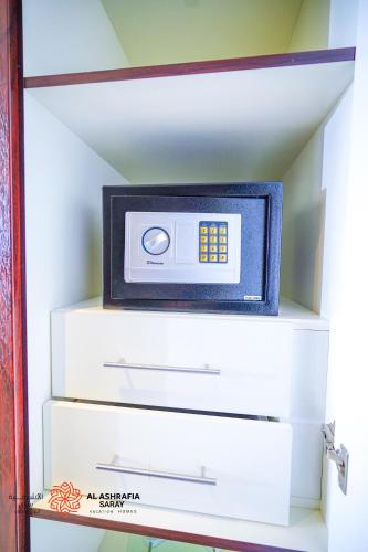 Alashrafia Saray- Homey 1BR apartment in Sport City, Dubái (foto 4)