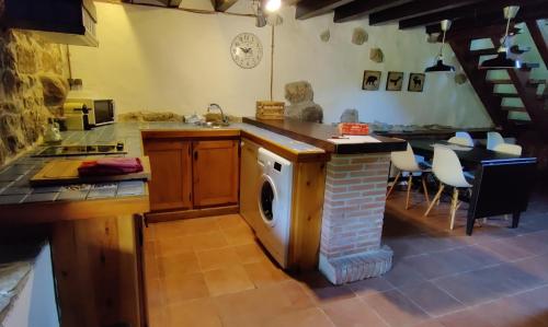 ห้องครัว, Pidream Cottage . Cabañas de Pisueña (Pidream Cottage . Cabanas de Pisuena) in โซโม