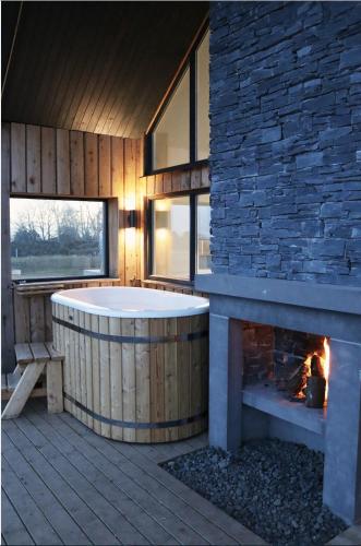 Балкон, Eco-Lodge with hottub sea view Charleton Estate in Колінсберг