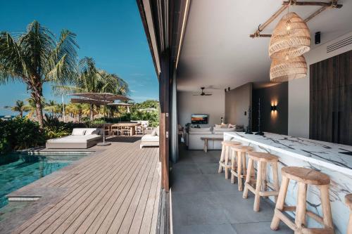 สวน, คอนติกิ บีช รีสอร์ต (Kontiki Beach Resort) in มารี ปัมเปิน