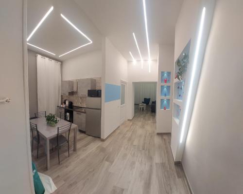 Casa Cosmedin, Naples