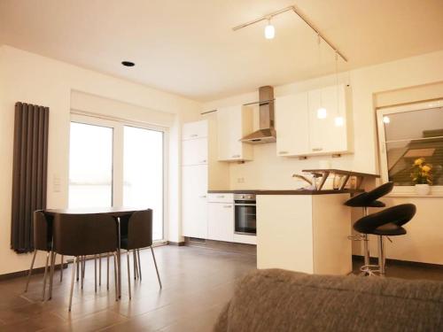 3 ZKB Einliegerwohnung im Neubau (73m²) mit Ladesäule