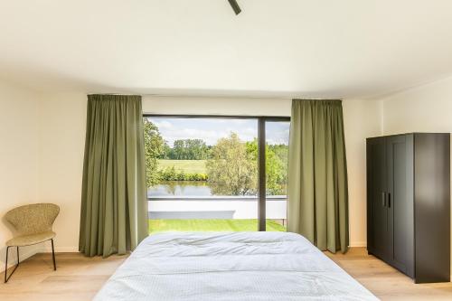 Leie Villa II - by the river with sauna & jacuzzi