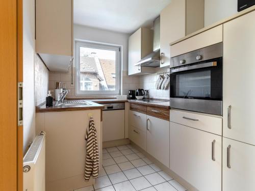 ห้องครัว, Arena in der Nähe - Tiefgarage - Balkon - Küche - Smart TV (Arena in der Nahe - Tiefgarage - Balkon - Kuche - Smart TV) in เกลเซนเคียร์เชน