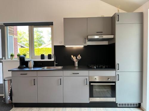 Konyha, Modern Vacation home - Near the Wadden Sea in Tzummarum