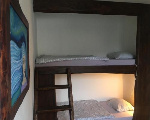 1 twin bed, 1 bunk bed