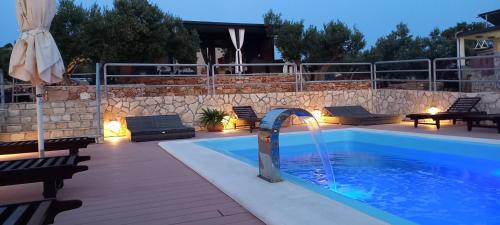 Beach house Danica - resort & tavern BAIN, free transport, pool, Island of Žut - Kornati (Beach house Danica - resort & tavern BAIN, free transport, pool, Island of Zut - Kornati) in Žut