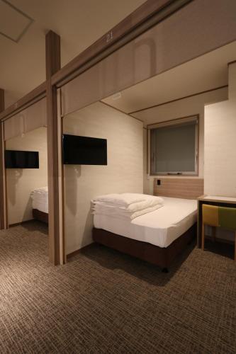 Cabin & Capsule Hotel J-SHIP Osaka Namba, Osaka (foto 2)