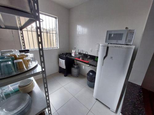 keuken, Casa completa e aconchegante em Ribeirão das Neves (Casa completa e aconchegante em Ribeirao das Neves) in Ribeirao Das Neves