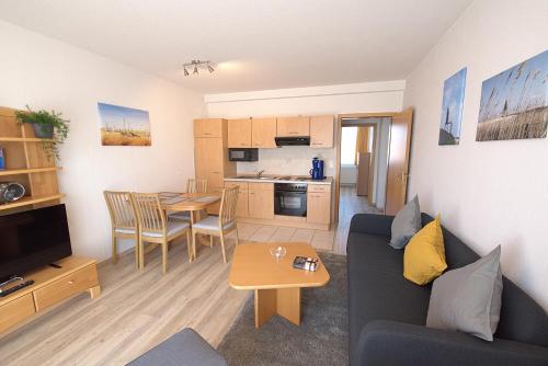 Apartment "Seelilie" mit sonnigem Südbalkon Sauna und Parkplatz - 200m zum Deich in Dorum Neufeld, Deutschland