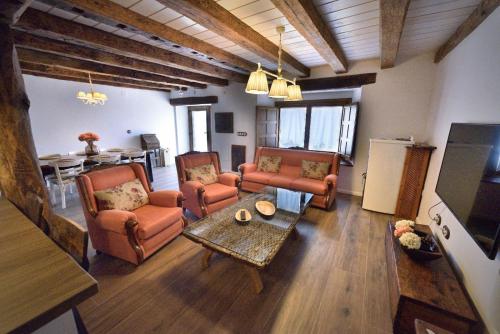 Koplietošanas atpūtas telpa ar TV, Casa Rural El Rotejar in El Royo