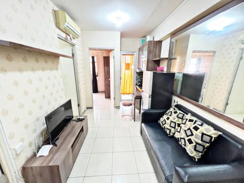 Homey 2BR at Green Bay Pluit Apartment near Mall